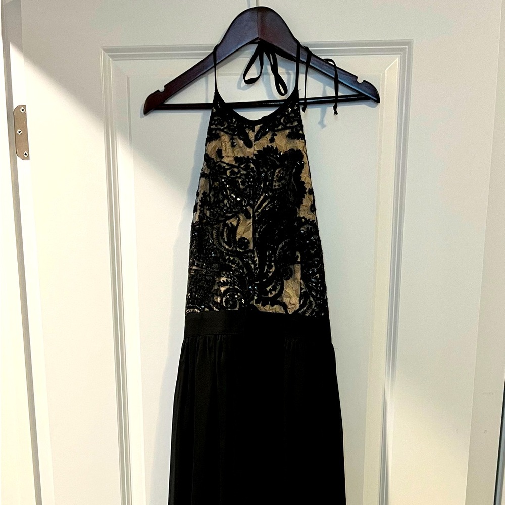 Francesca’s Dressy high low dress with beautiful black beading.